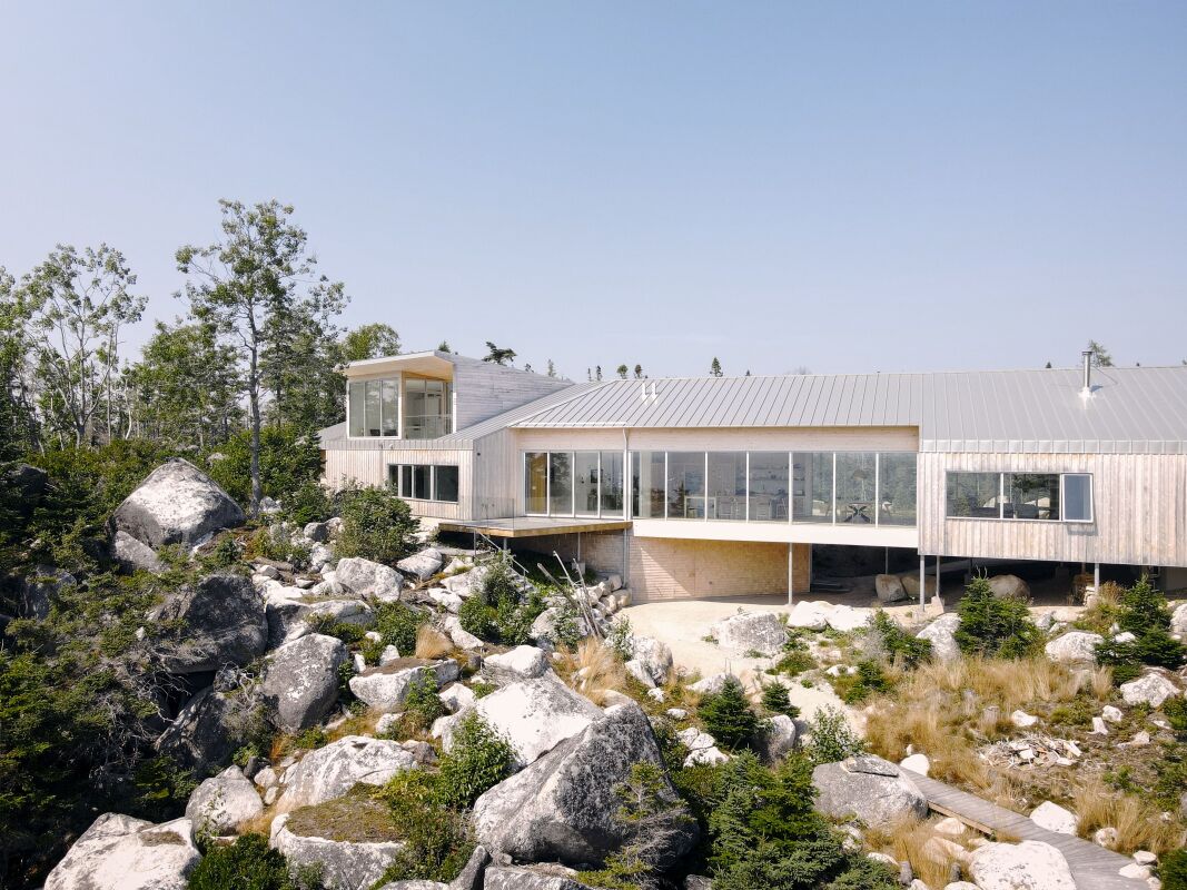 Coastal home hovers above Nova Scotia valley on slender steel legs
