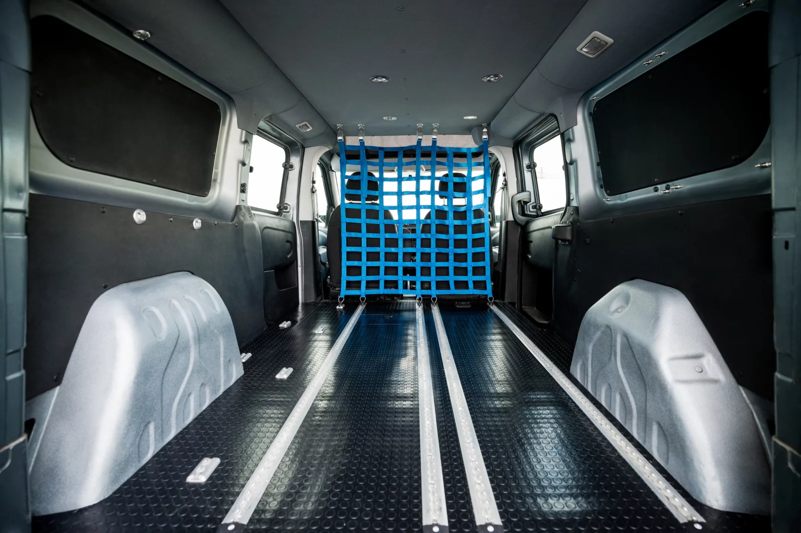 Empty van interior with available cargo net