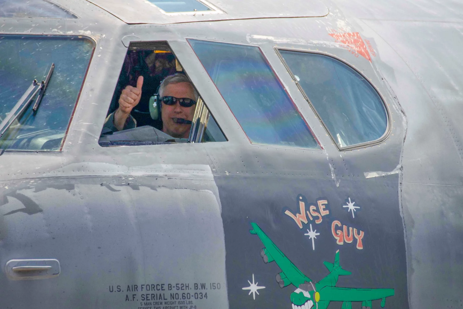 Colonel Robert Burgess, 307th Operations Group commander at the controls of "Wise Guy"