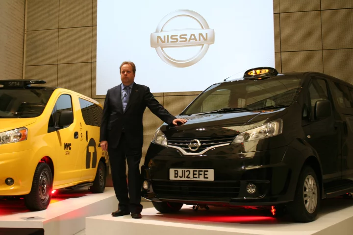 Nissan's Andy Palmer poses next to London's new NV200 black cab (Photo: Gizmag)