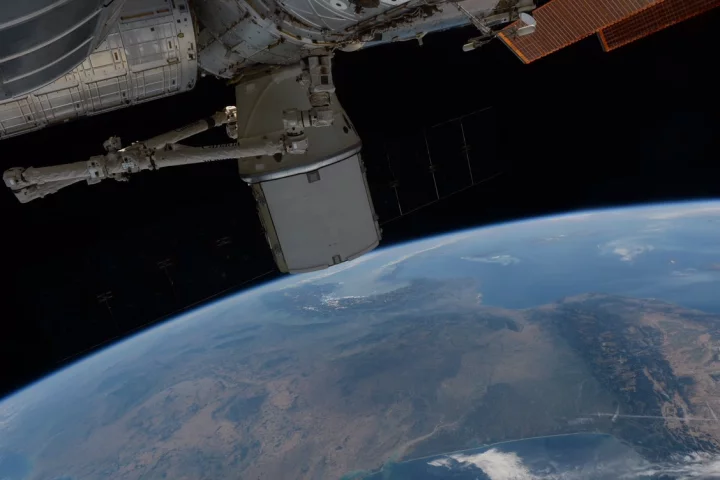 The Dragon spacecraft over Europe ahead of its return to Earth