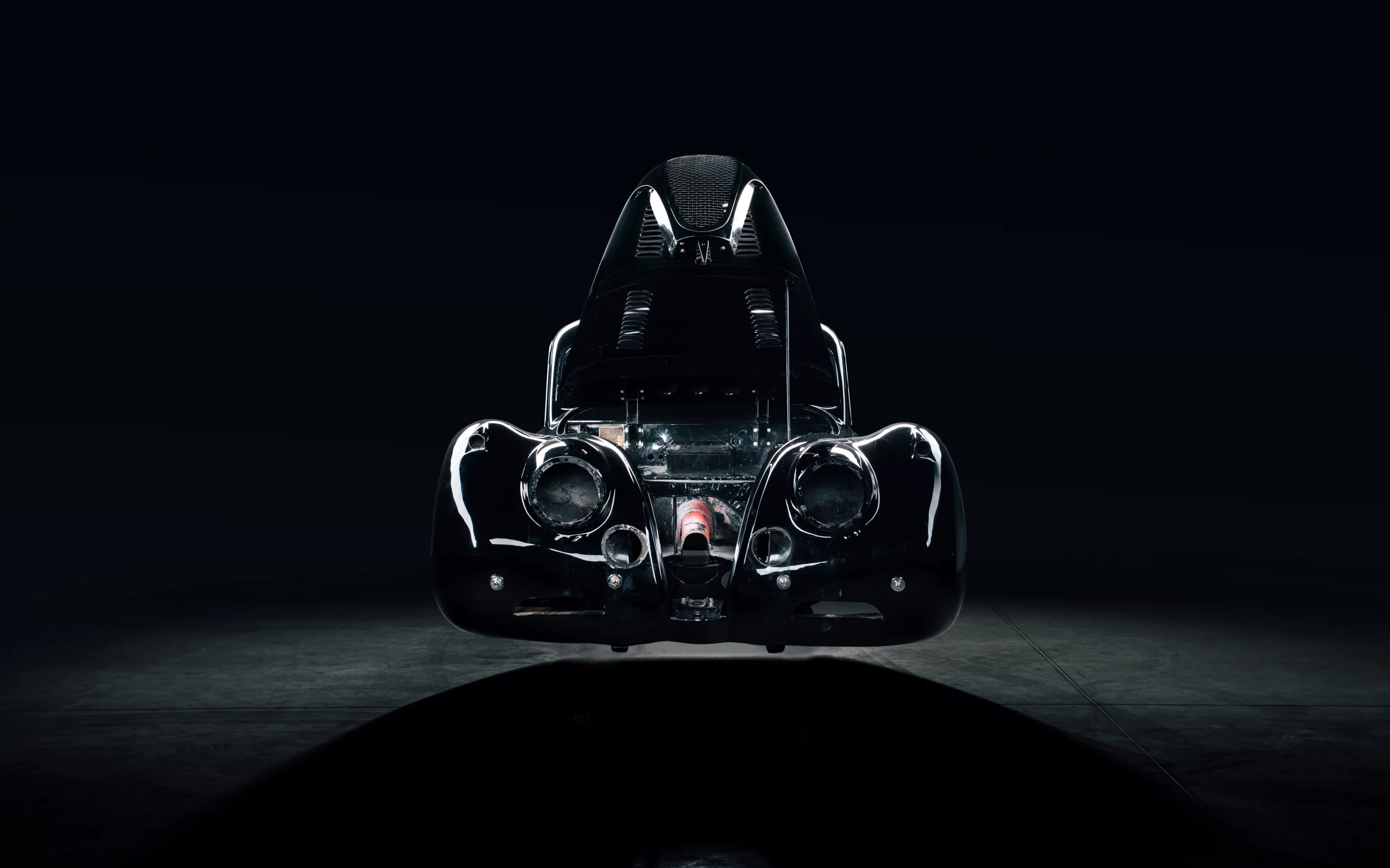 The cars are stripped back to their metal exteriors, then 3D scanned so the bespoke powertrain needed can be designed by computer