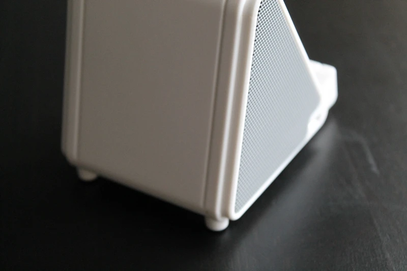 The speakers are covered with metal grills