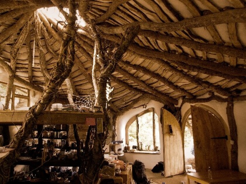 The Hobbit home is made from local oak wood, stone and mud retaining walls, with straw baling for insulation (Photo: Simon Dale)