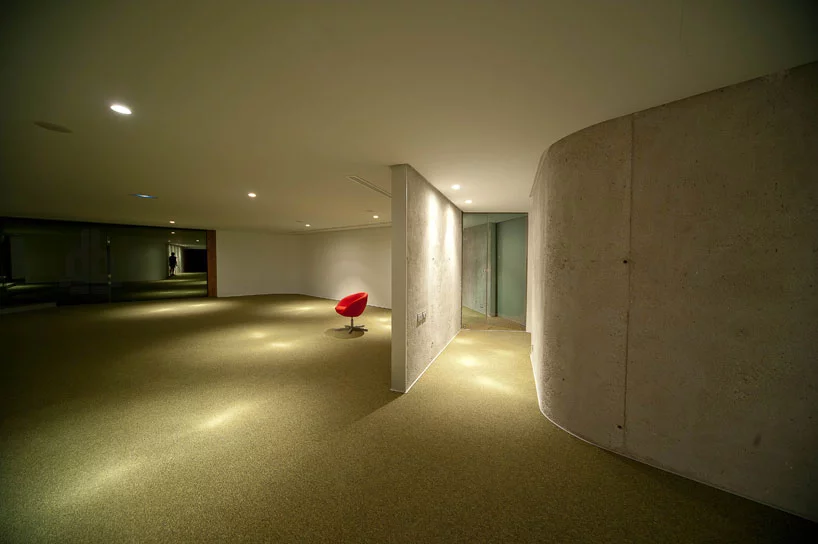 The large open interior space is simple and clean, with furnishings being kept to the bare minimum