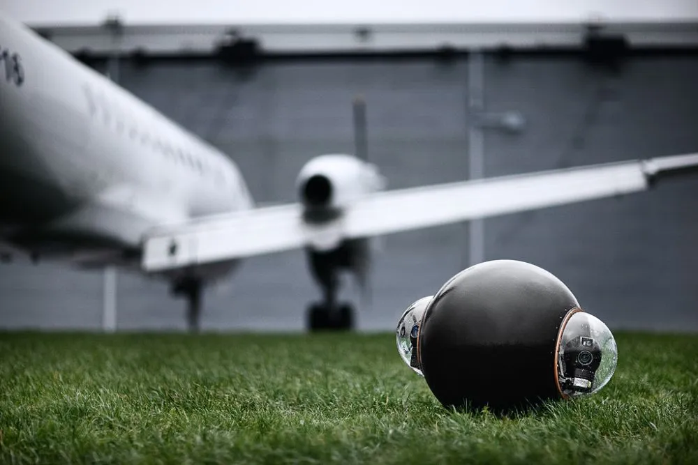 The Rotundus GroundBot spherically-shaped surveillance robot is equipped with a pair of cameras providing its remote operator with a live video feed in 3D