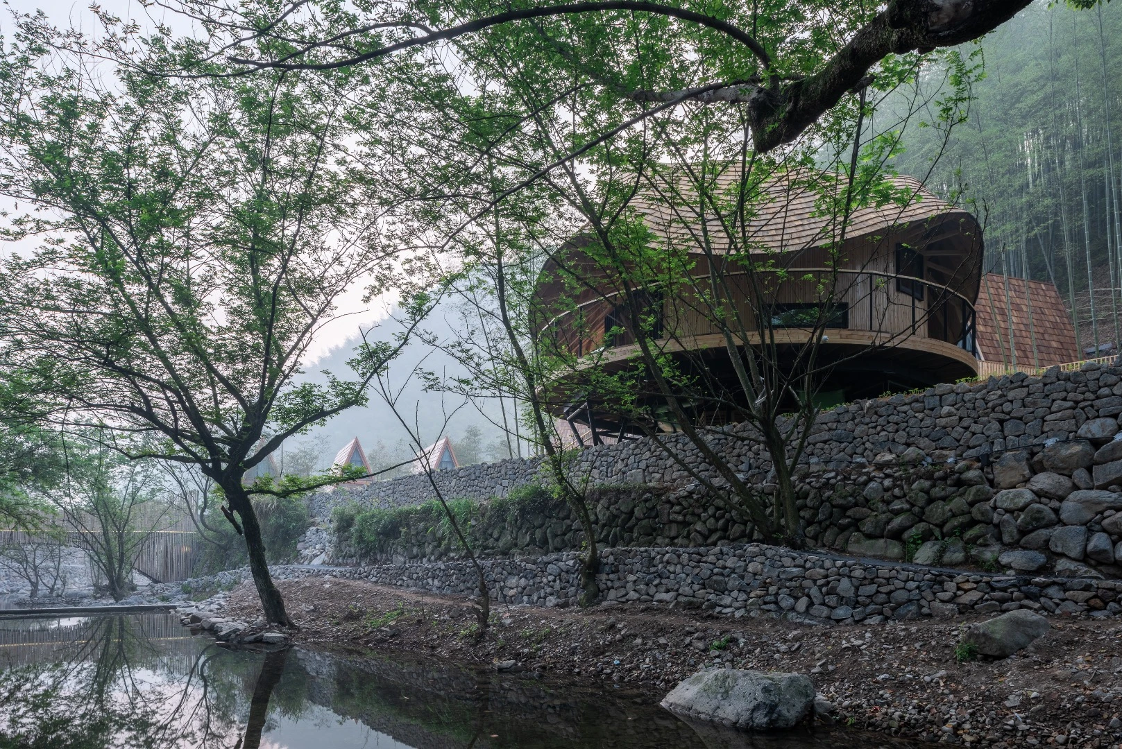 "The crude hand construction of traditional dwellings is different from fine production under standardization and industrialization," says Monoarchi, who used local craftsmen in the construction of Treewow Villa O