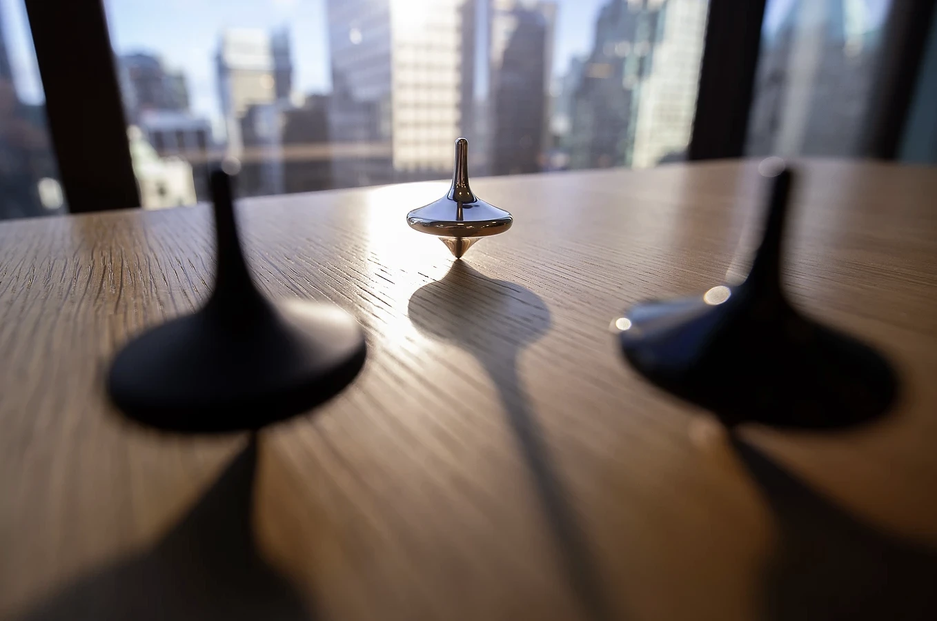 Limbo is actually a self-balancing gyro that keeps on spinning long after regular tops topple
