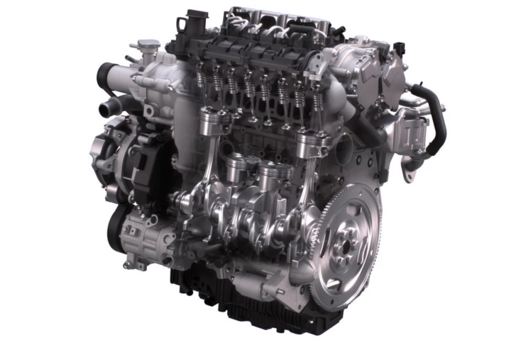 Cutaway of the Skyactiv-X engine showing the dual ports and valves in the inline-four design