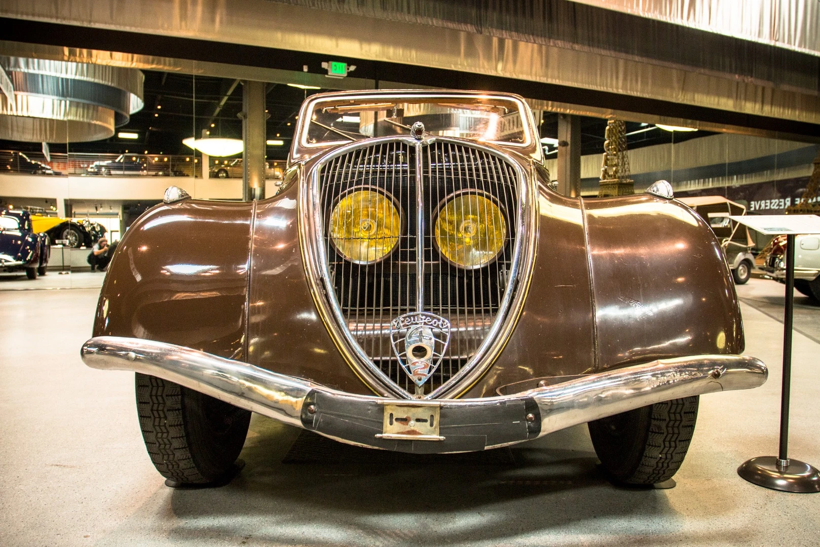 1937 Peugeot 402L Cabriolet Metallique Decouvrable: this streamlined front end became a signature element of Peugeot's cars in the thirties. Even for the time, it was regarded as pretty out there in terms of styling!