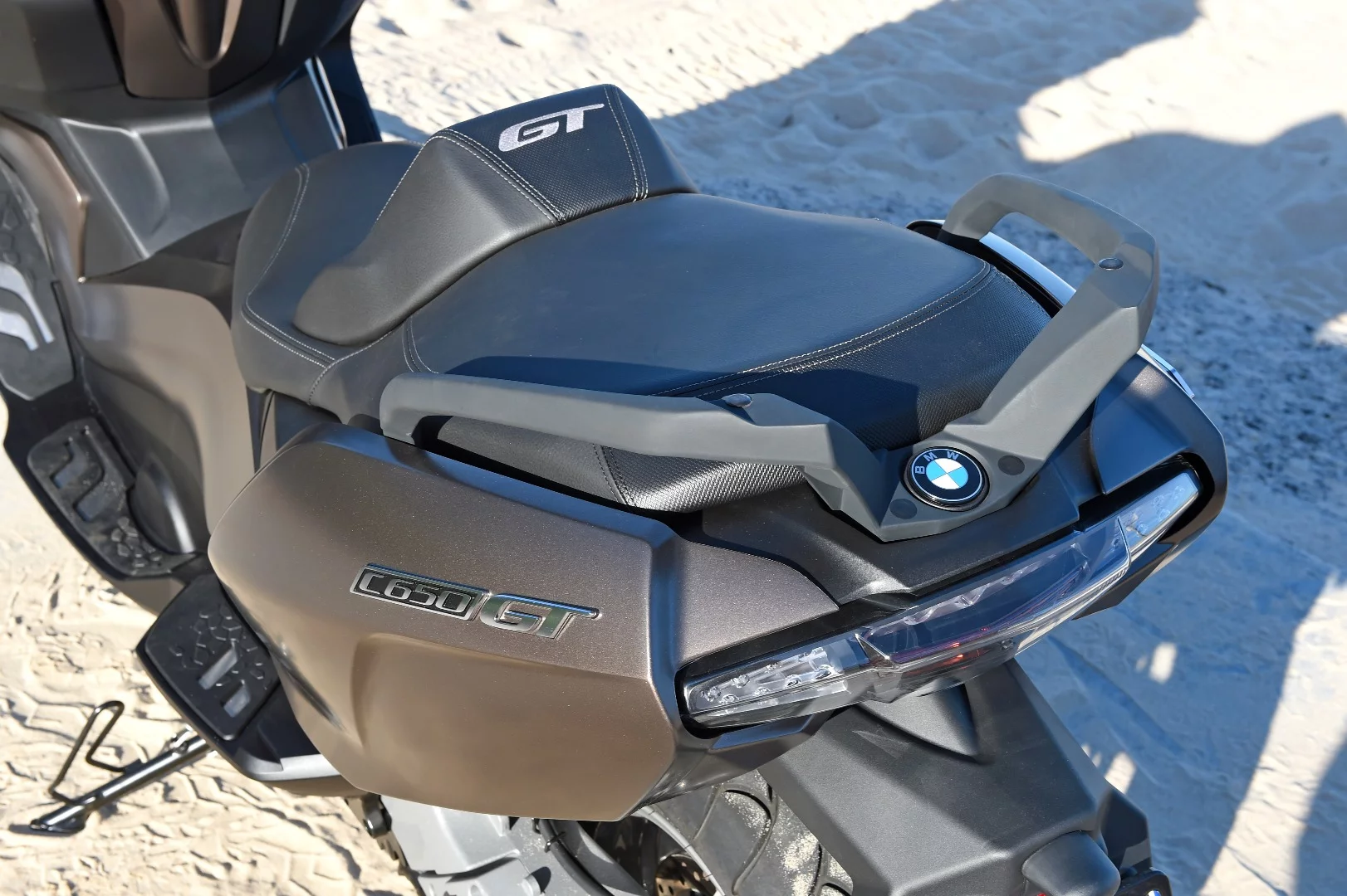 BMW's C650 GT: passenger seat is even roomier, and the rider gets a large bump stop at the back of the seat
