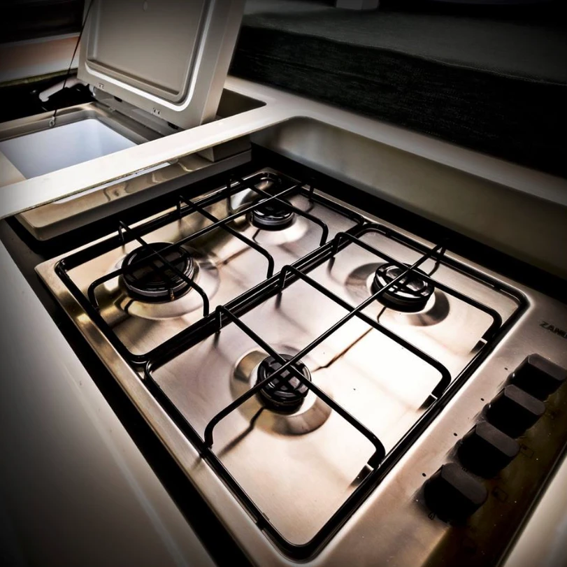 The four-burner stove makes it easier to prepare a full meal