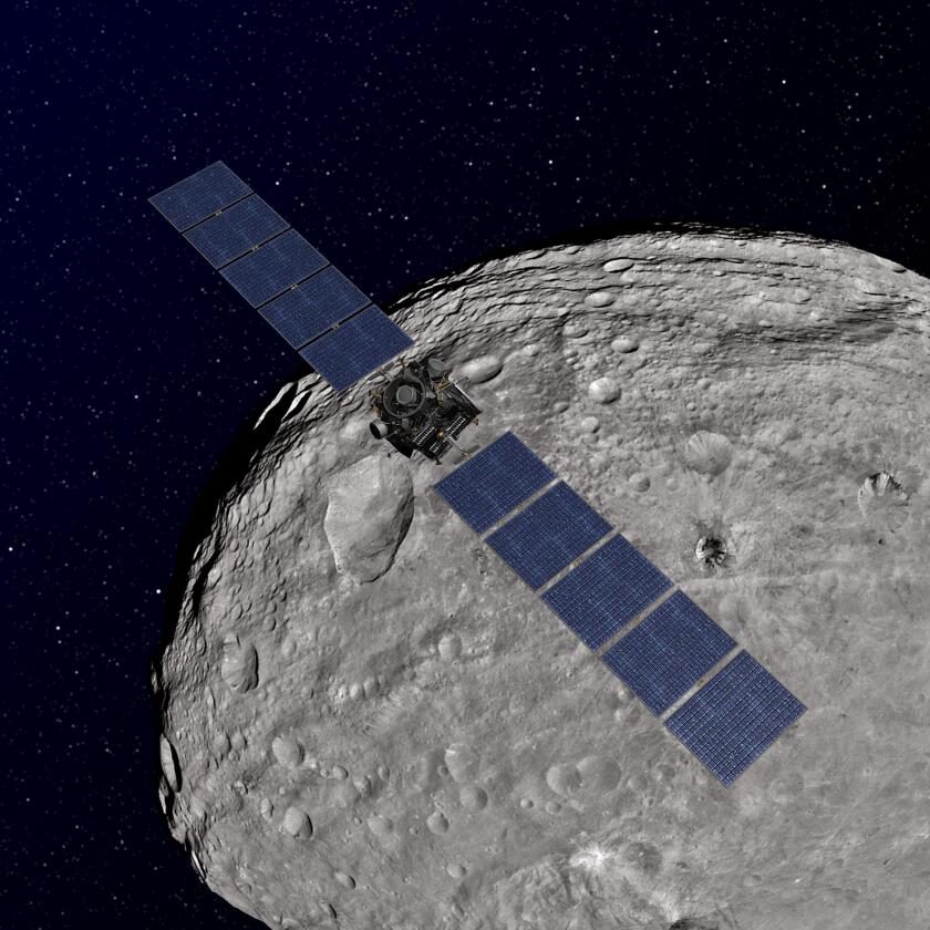 Artist's impression of Dawn orbiting Vesta (Image: NASA)