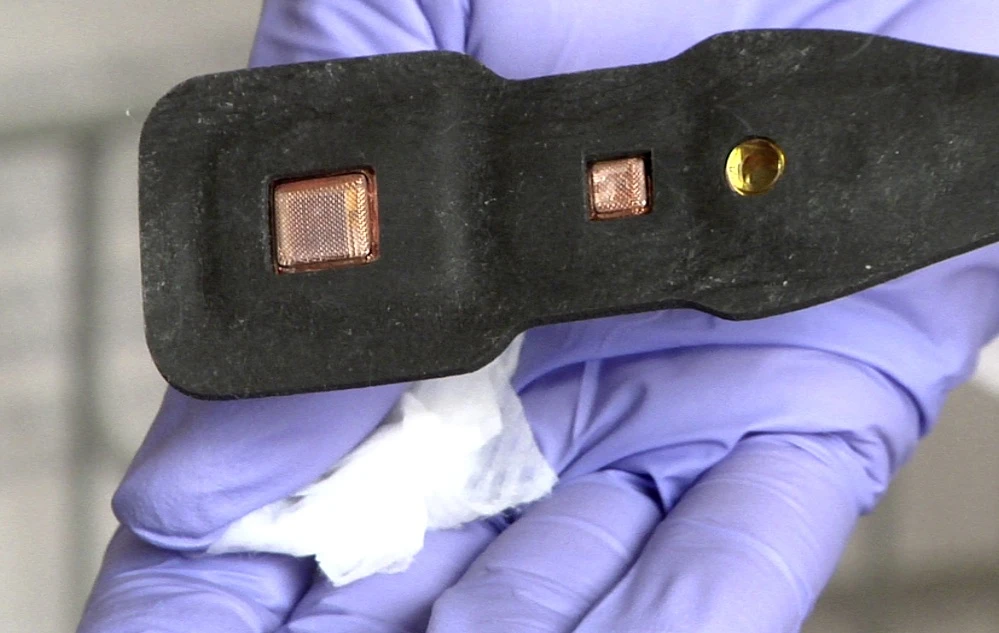 The underside of the NIRS device