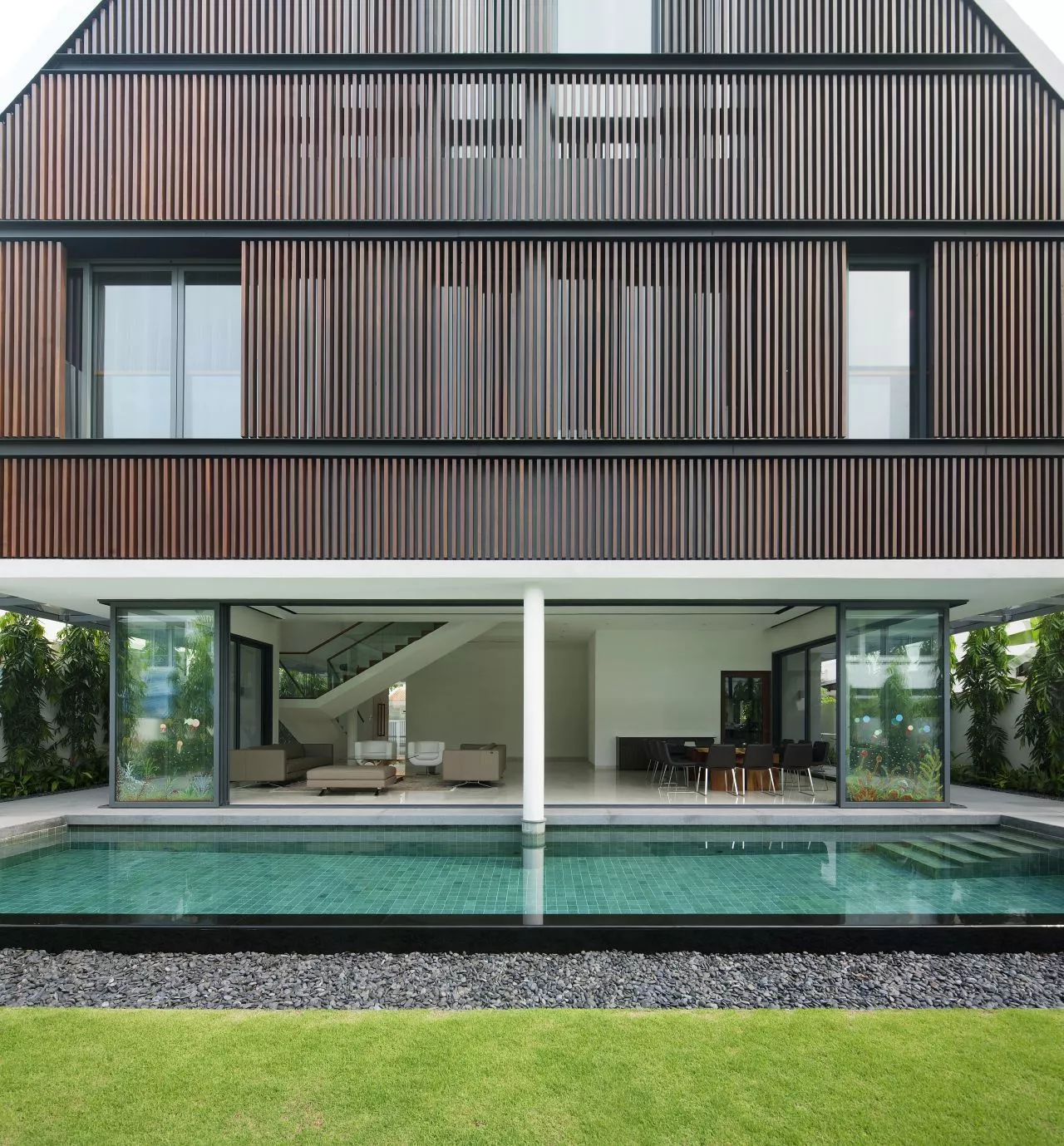 The north and south facades feature multiple function timber screens (Photo: Jeremy San)