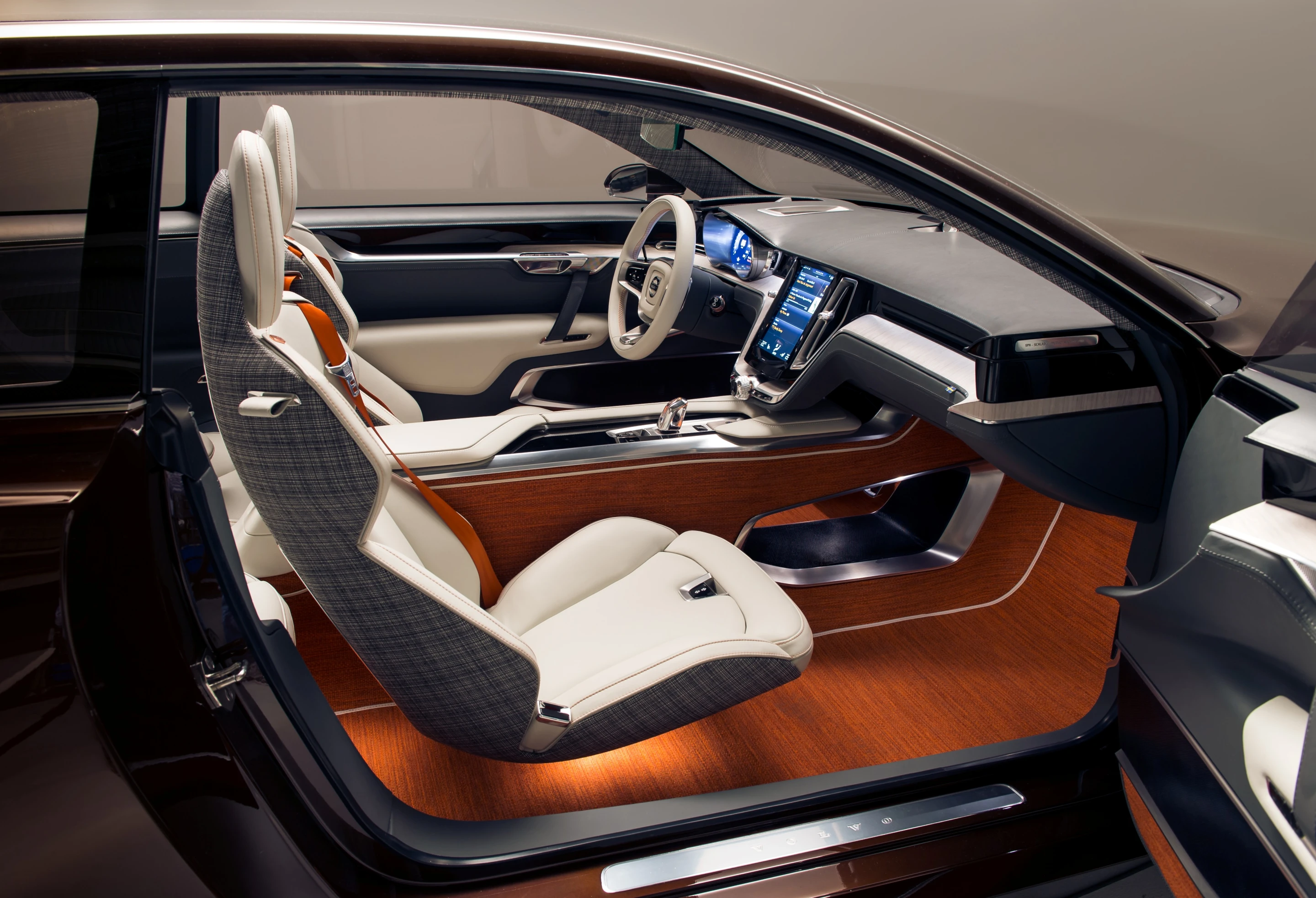 All passengers are privy to the concept's orange seat belts and woven wool carpets from Swedish designer Kasthall