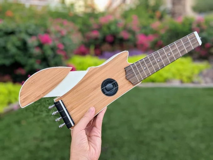 The Ava ukulele has a fold-out wing to help with forearm playing comfort