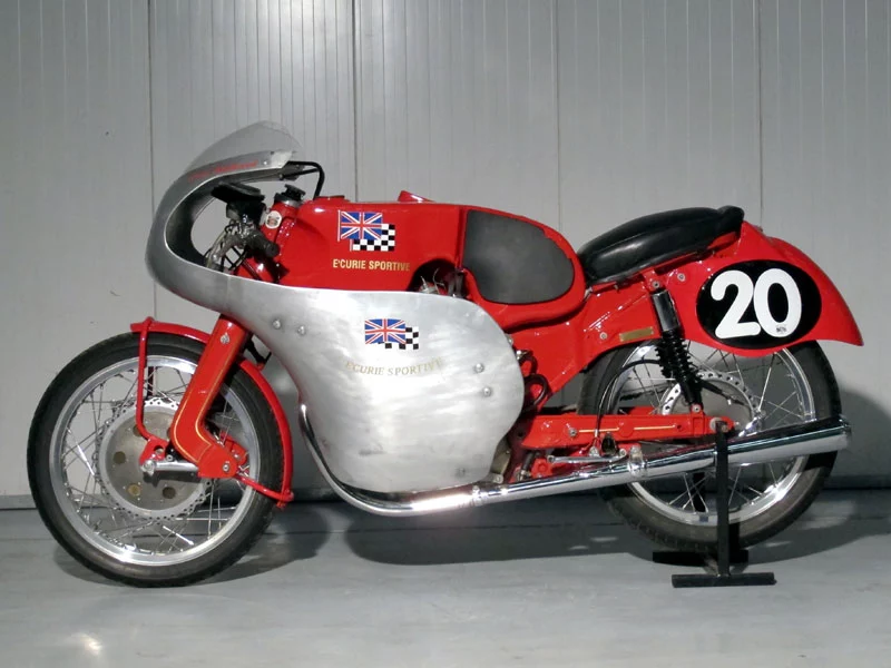 This single cylinder 250cc NSU Sportmax is arguably the most successful Sportmax in history, having given two of the all-time-greats their Grand Prix results. It was purchased by John Surtees in 1955, who used the machine to win races at Crystal Palace and Silverstone in addition to his first world championship victory at the Ulster Grand Prix. Towards the end of 1957 he sold the machine to Stan Hailwood for use by his son Mike. Mike took the bike to South Africa for the winter winning and setting lap records in every race he contended. In 1958, 18-year-old Mike rode the bike to 34 podium places including 25 wins, gaining his first World Championship points and his first world championship podium finish in the 1958 250 Isle of Man TT. This 1955 NSU Sportmax was sold by H&H Classic Auctions at its Imperial War Museum sale in April, 2014 for GBP£69,440 (US$116,634).