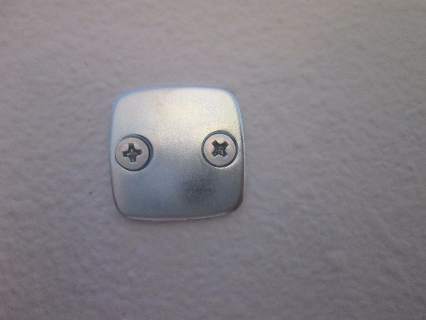 The Ezviz Mini camera has an included steel mounting plate