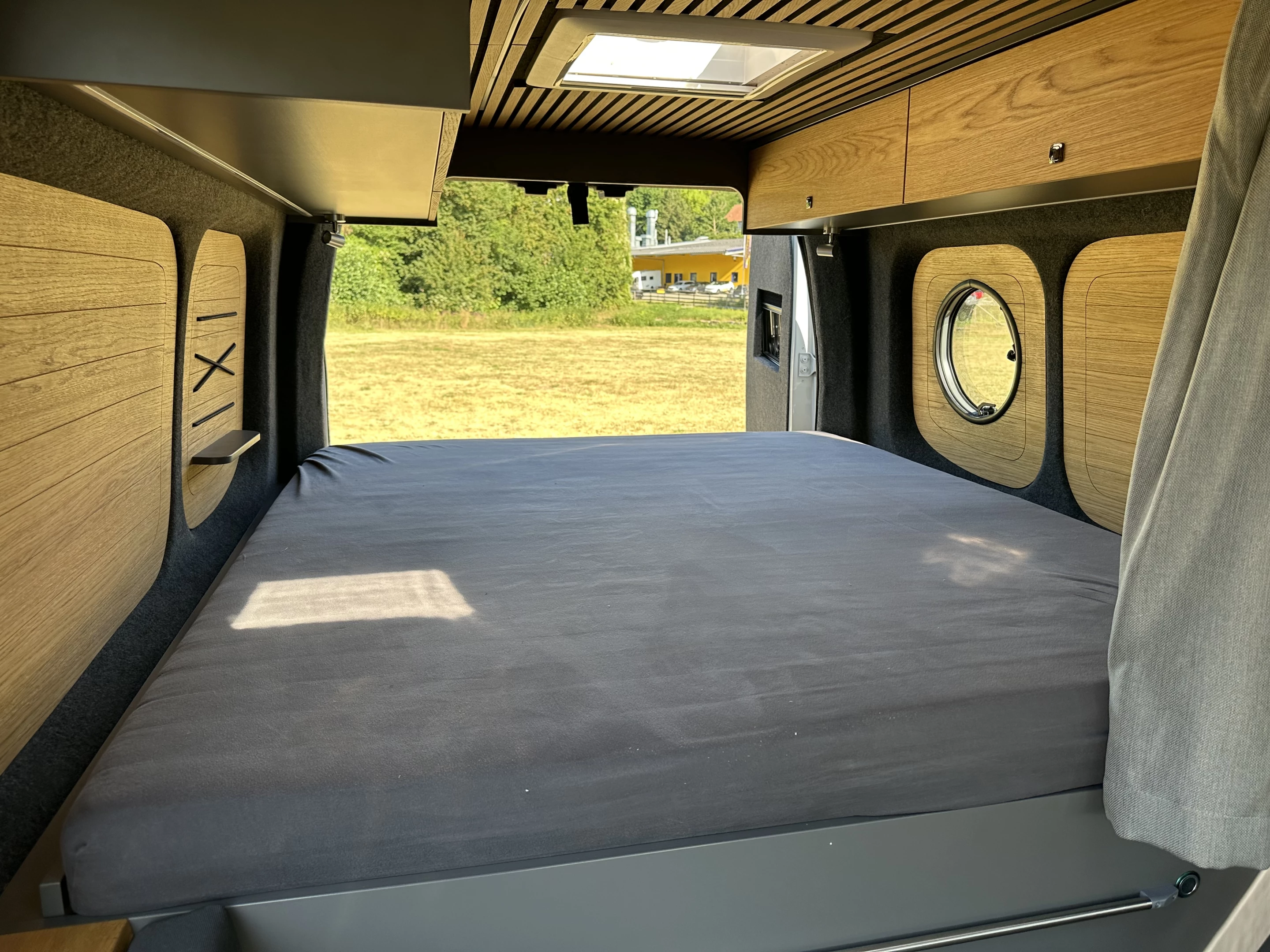 Rustic trim throughout and a whimsical porthole window add serious warmth and personality to the Eiffeland Interstar-e Relax