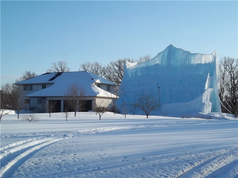 Roger Hanson's gigantic backyard ice sculpture for this year, made using water from his home's geothermal heating system