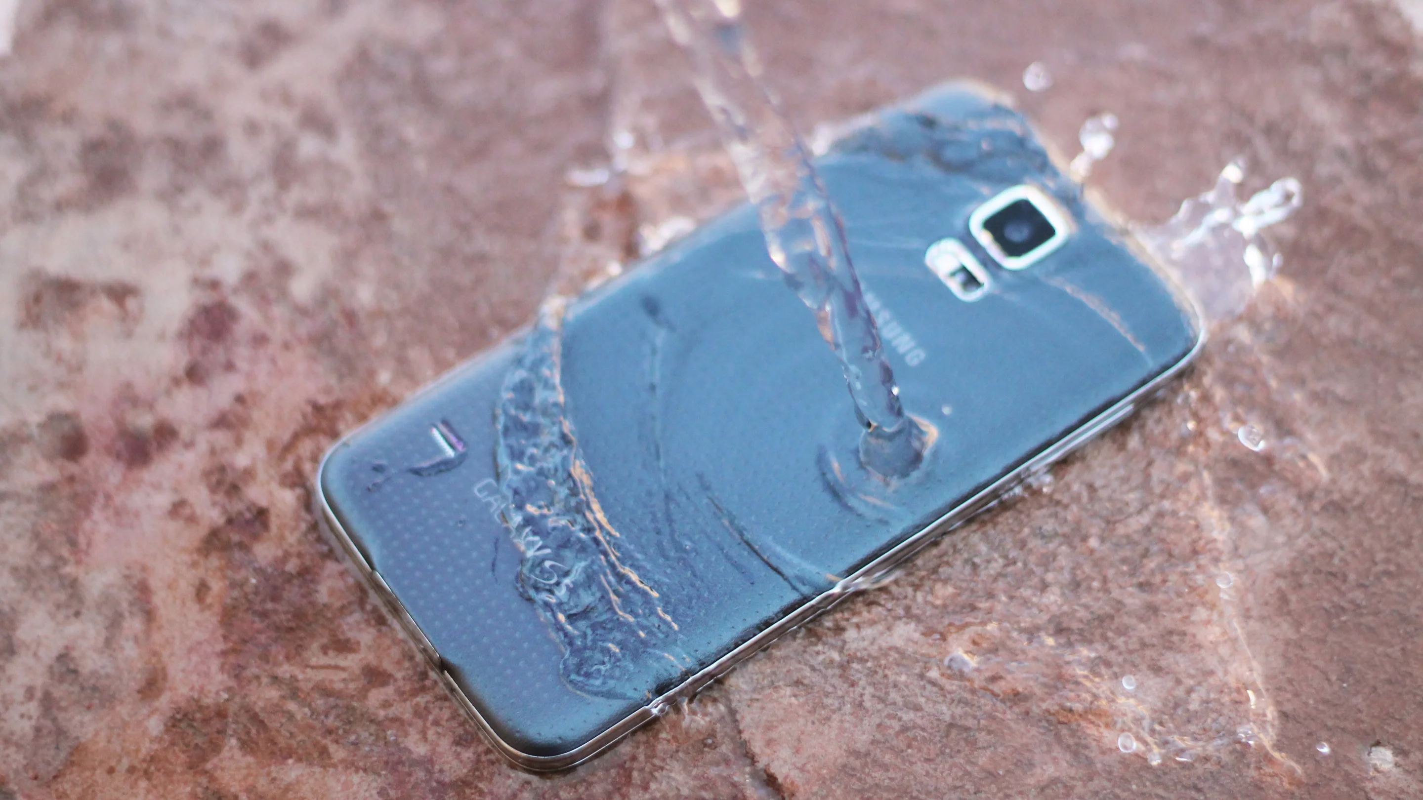 The Galaxy S5 is water and dust resistant, rated IP67