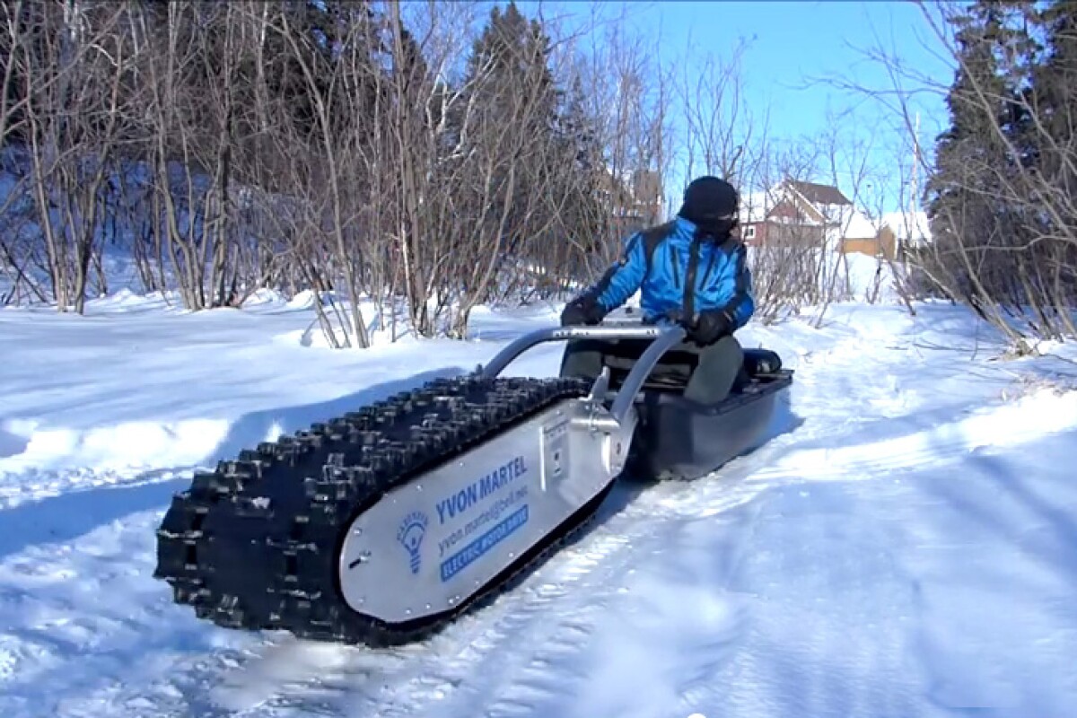 The MTT-136 (short for "My Track Technology" and the 136 inch snowmobile tread) is capable of doing the grunt work across some very tough terrain