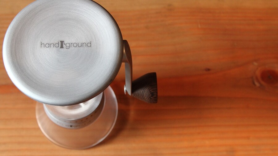 The Handground coffee grinder has a lockable top lid to stop coffee beans from flying out while they are being ground
