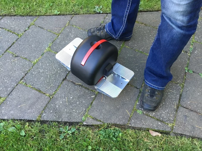 As with the original Solowheel, the rider steps into foot rests and leans forward to move off