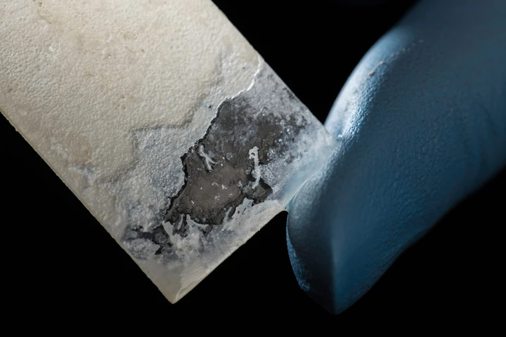 A sample of the artificial nacre, deposited on a glass slide