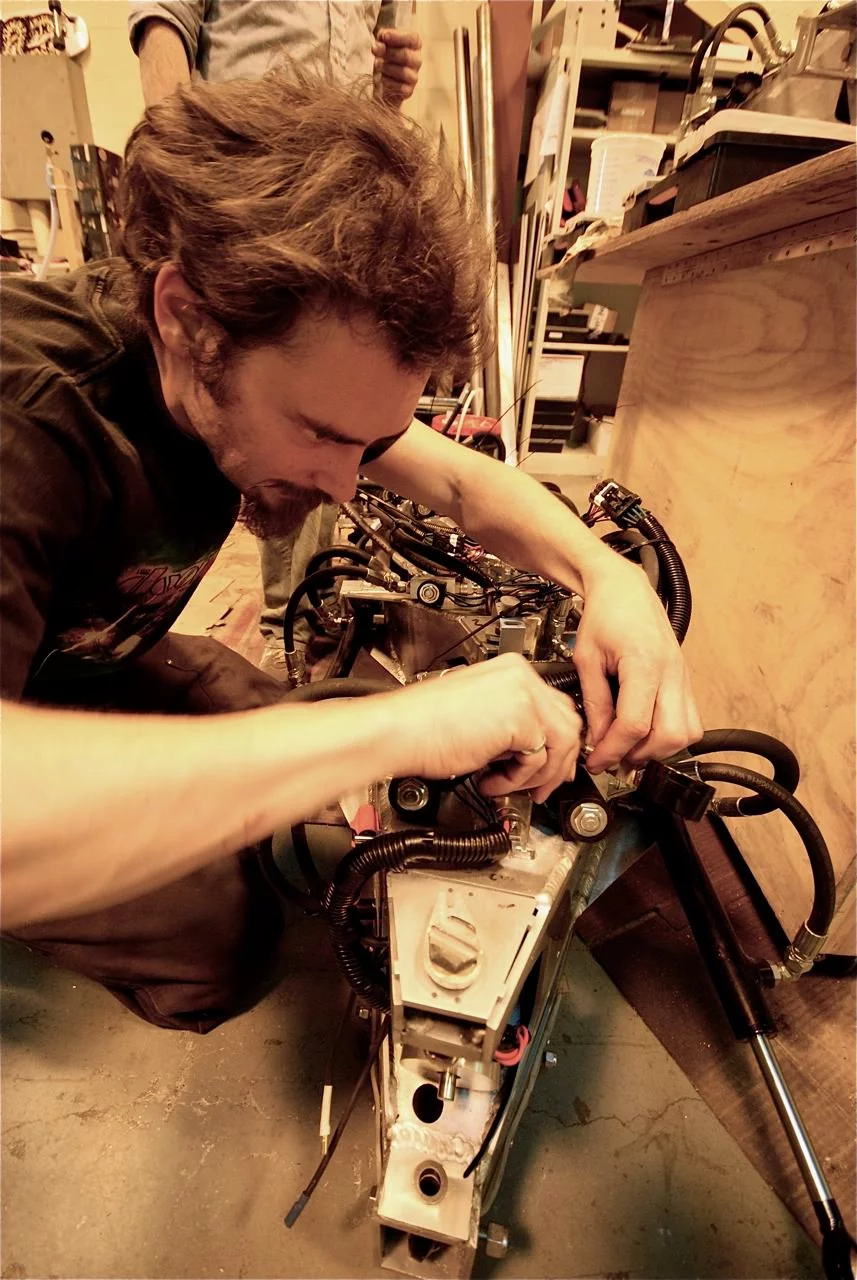 Artist Charlie Brinson working on Titanoboa