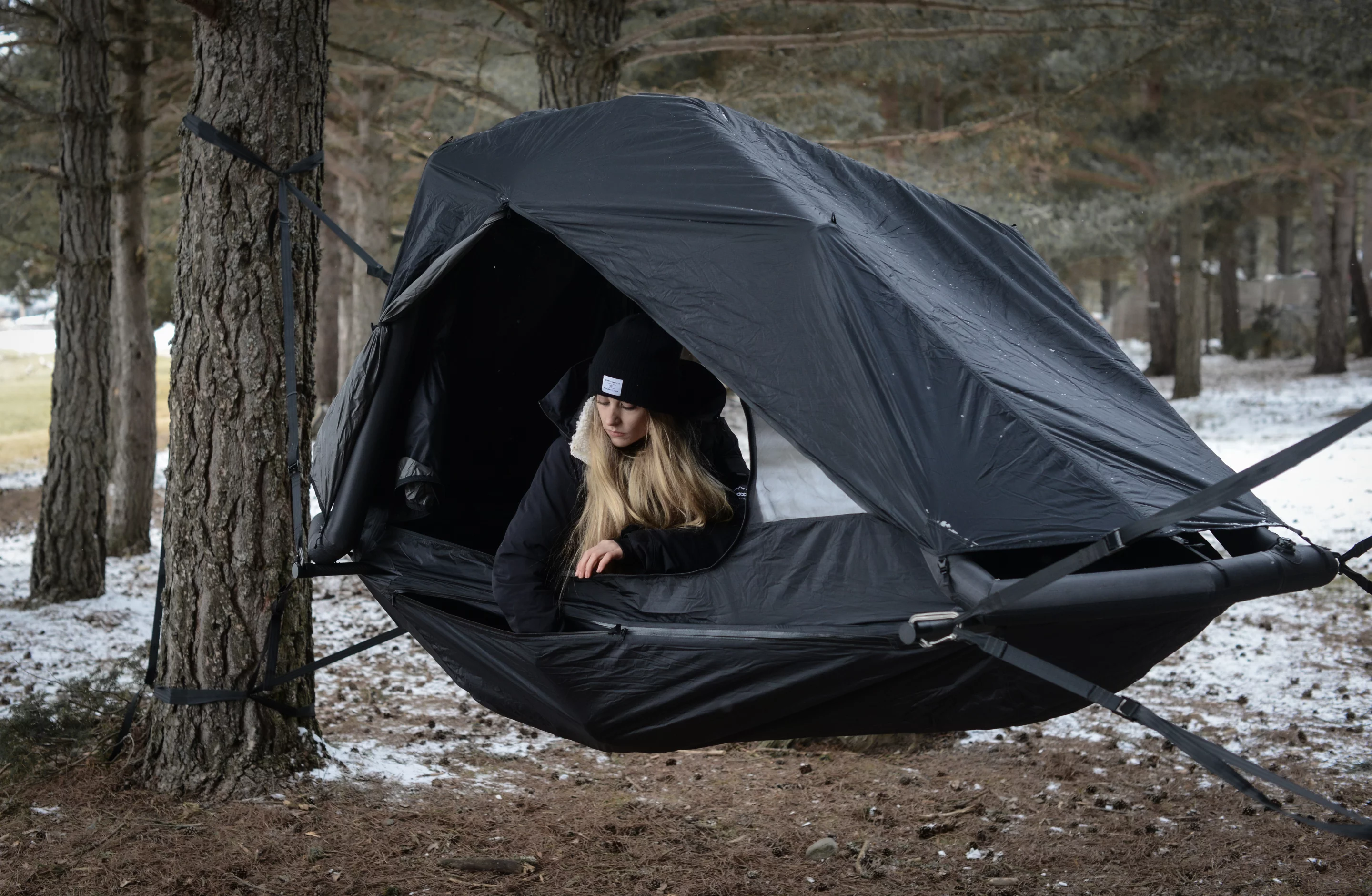 Carry the carbon fiber stretcher bars and straps, and you can sleep in suspended comfort