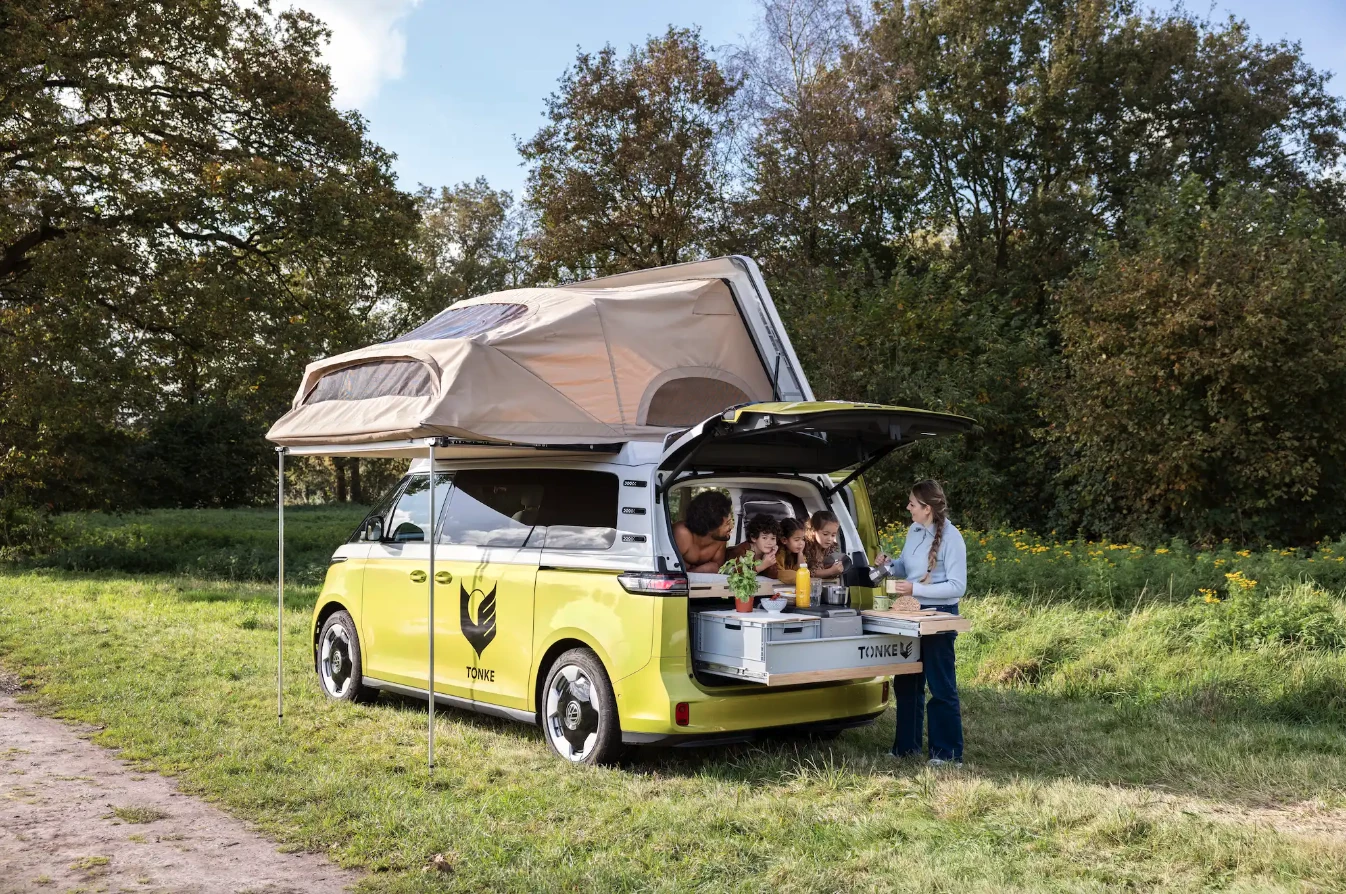 The ID. Buzz Trail, pictured here with optional pop-up roof, features Tonke's Buzz module with full-width folding bed and slide-out kitchen