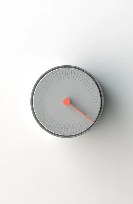 The pocket-sized World Clock measures 85 mm (3.3 in) in diameter and weighs 144 g (5 oz)