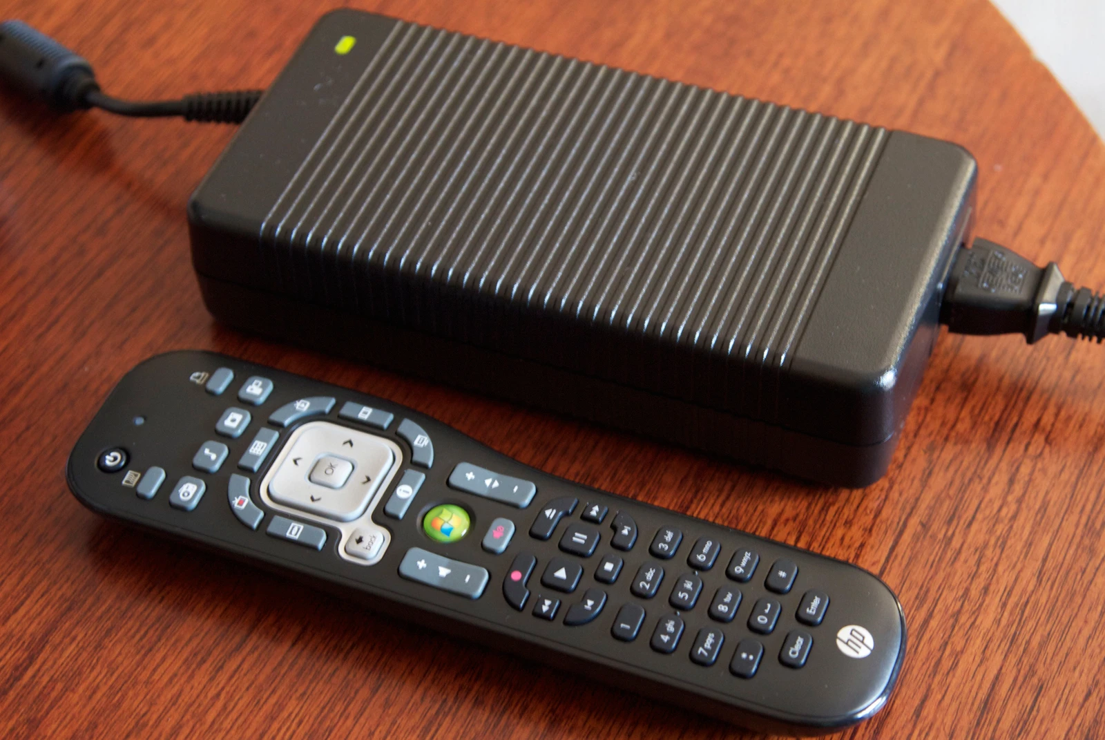 The power brick and optional media remote of the Omni 27