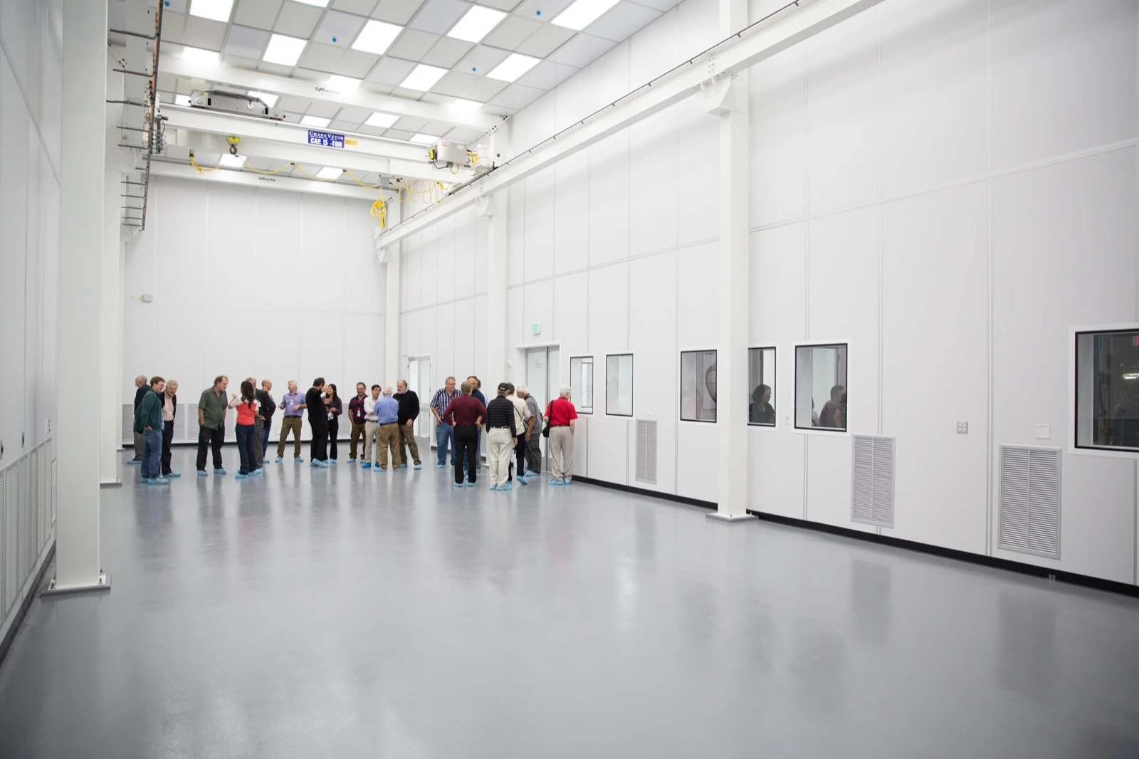 Visitors inspect SLAC’s newest clean room, which will serve as the assembly area for the 3.2-gigapixel camera of the LSST
