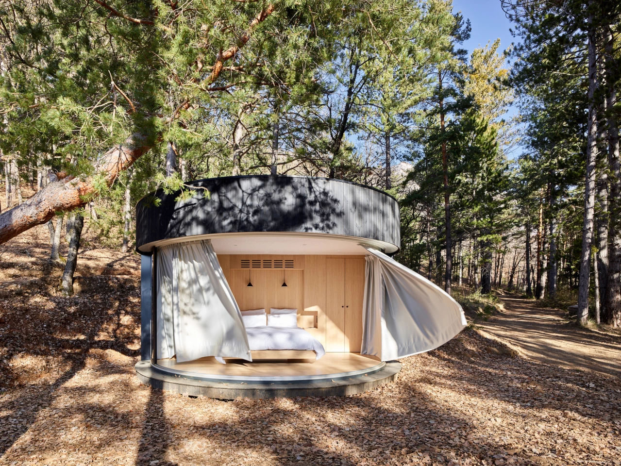 The LumiPod's exterior is finished in Douglas fir that has been charred following the Japanese Shou Sugi Ban method of burning wood to preserve it