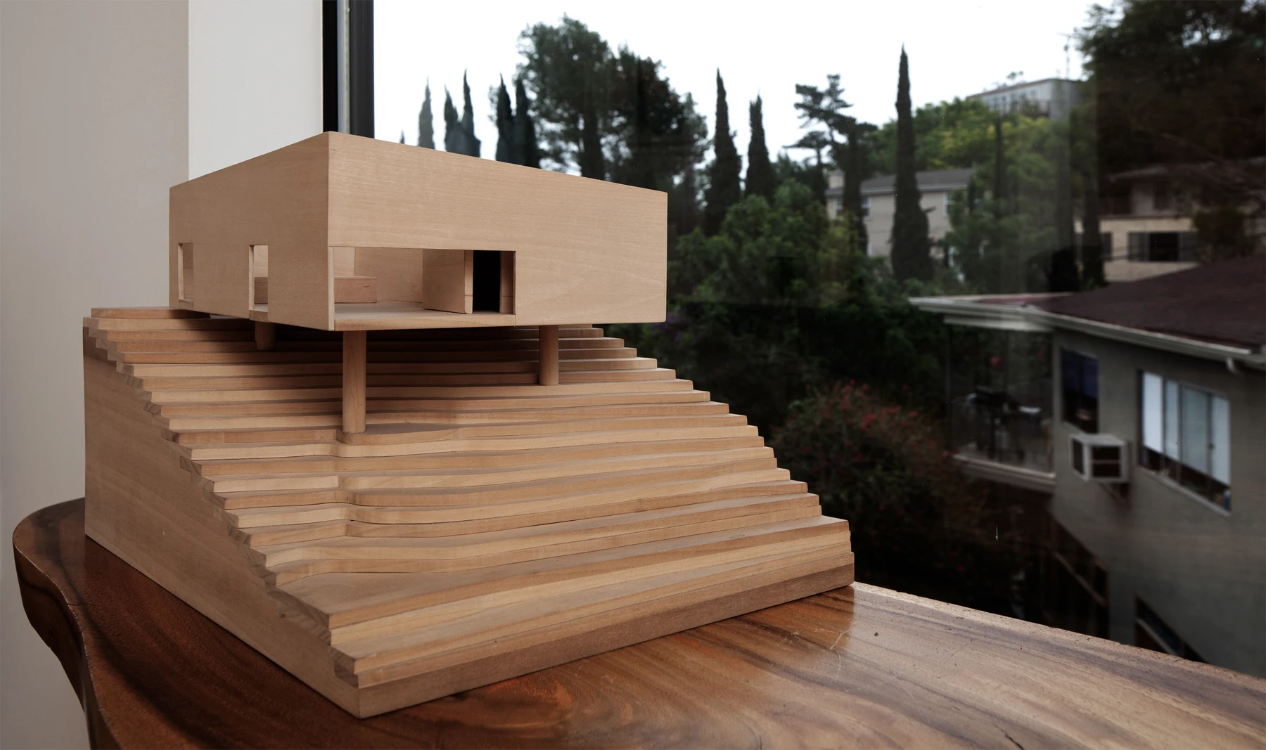 A wooden model of the Big & Small House