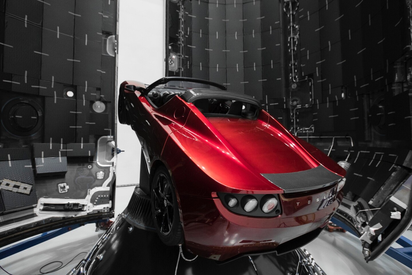Elon Musk first tweeted about blasting his midnight cherry red Tesla Roadster into space in early December