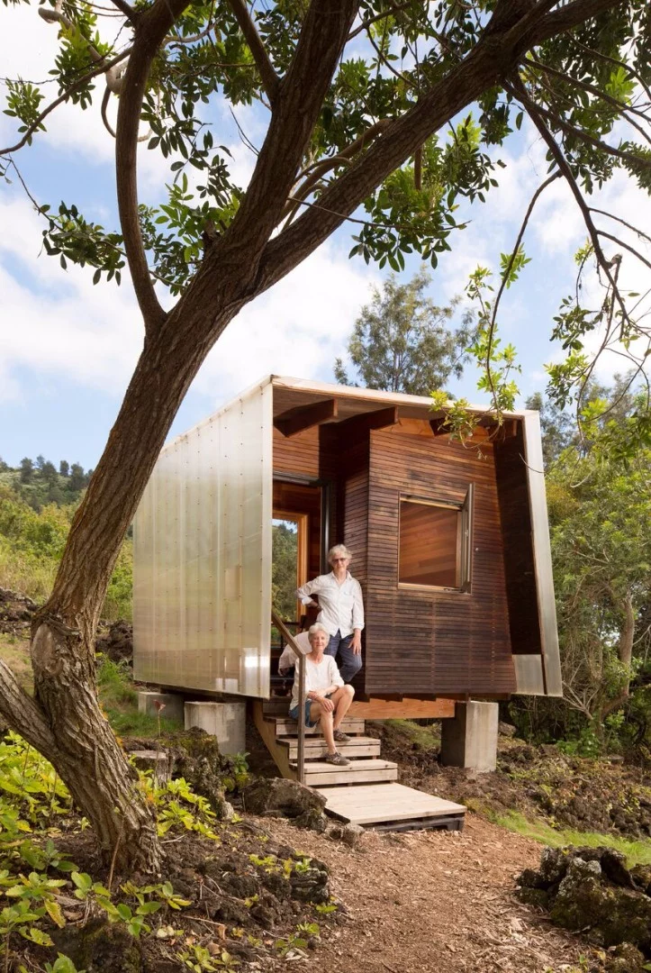 In keeping with the client’s wish to preserve the land, the pair of cabins are designed for modest living