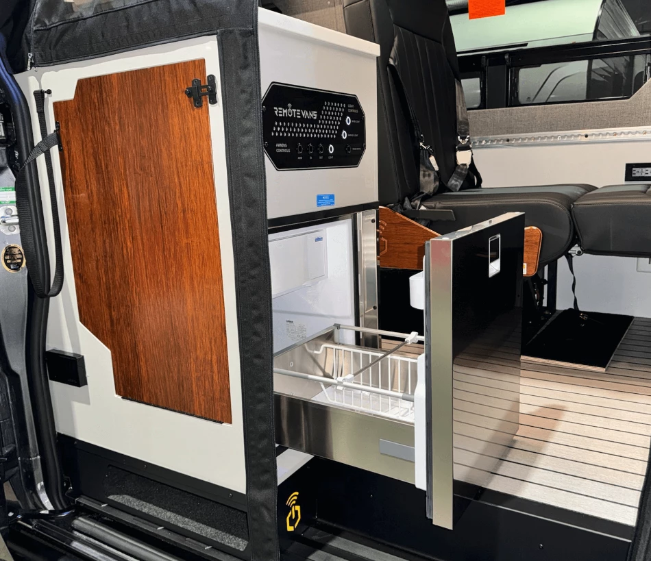 The kitchen comes with a stainless steel drawer fridge accessible from inside or outside