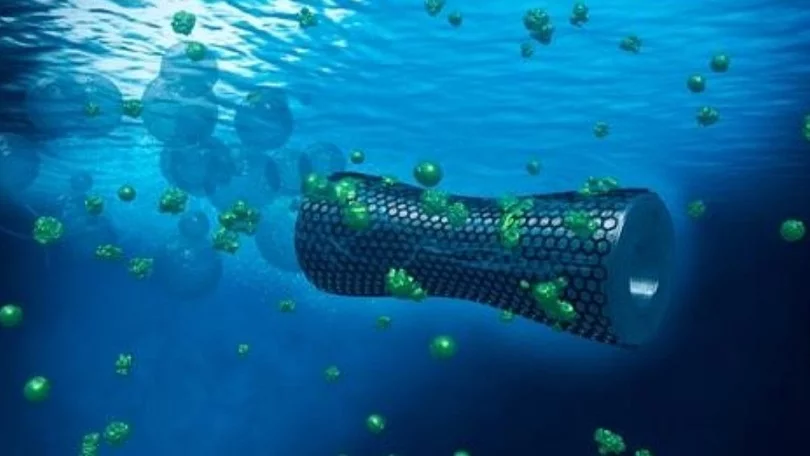 Artist depiction of graphene-coated microbot cleaning lead from wastewater.