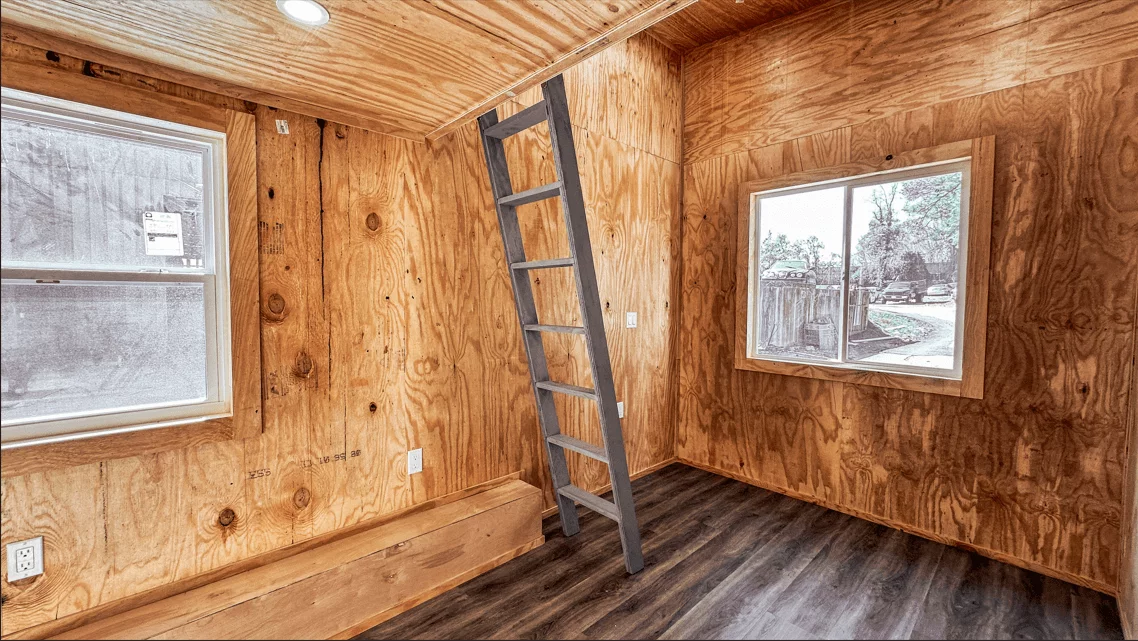 The Element 20's loft bedroom is reached by a ladder