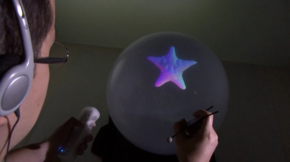 Spheree presents 3D models in a fish bowl-like display, which responds to changes in the viewer's perspective