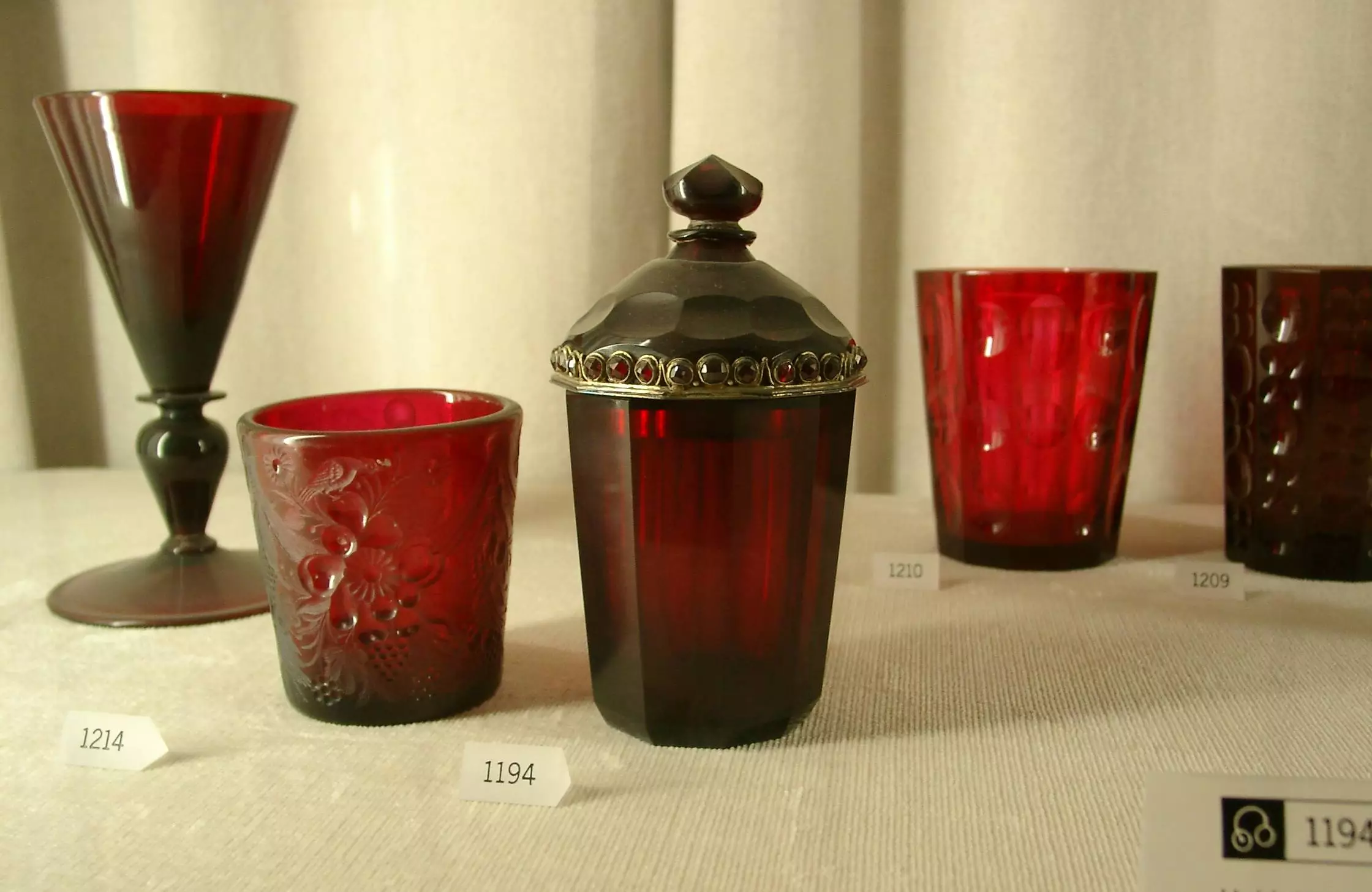 Examples of items made from gold-infused cranberry glass