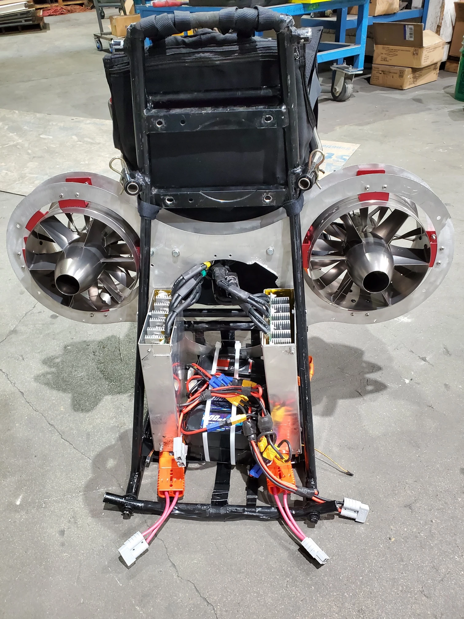 Rear of the prototype, showing the ducted fans and small battery pack