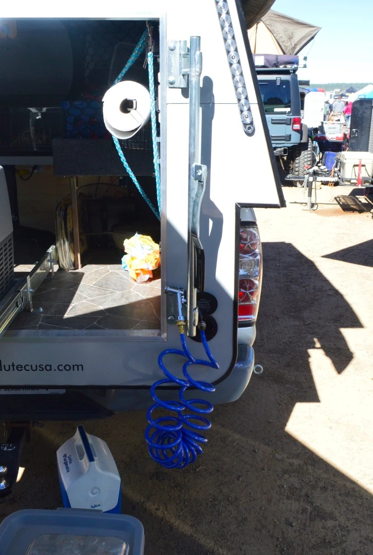 There's no faucet for the wash basin, but this Bivak has a more versatile hose