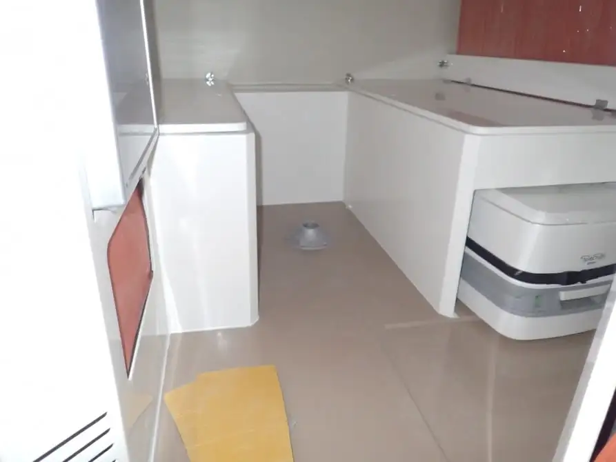 The EarthCruiser GZL includes a stowable toilet