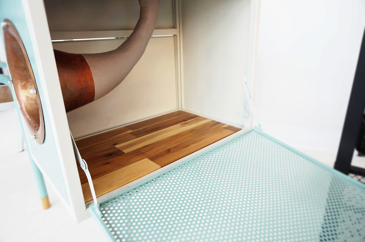 While the design is stunning in itself, the truly innovative feature is hidden away in a square-shaped cabinet on the right-hand side