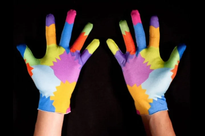 MIT researchers have unveiled a cheap and easy to use gesture recognition system which uses a colored glove, a webcam and some software with positive results